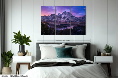 a bedroom scene with a bed and two paintings