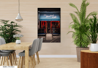 a dining room with a table and chairs