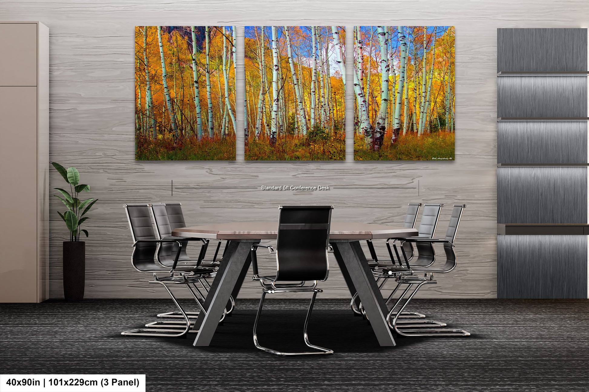 a dining room table with chairs and a painting on the wall