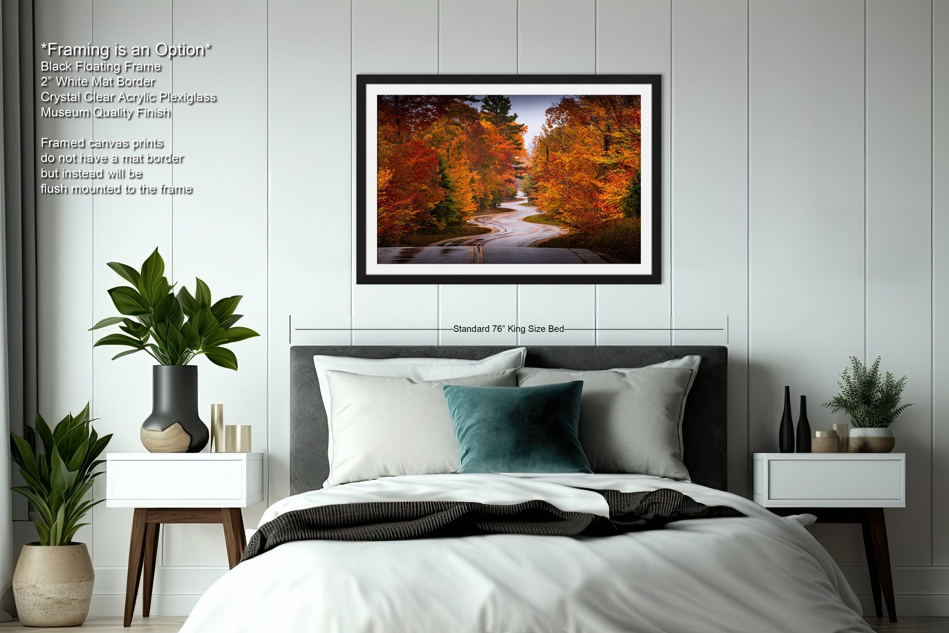 a bedroom with a bed and a picture hanging on the wall