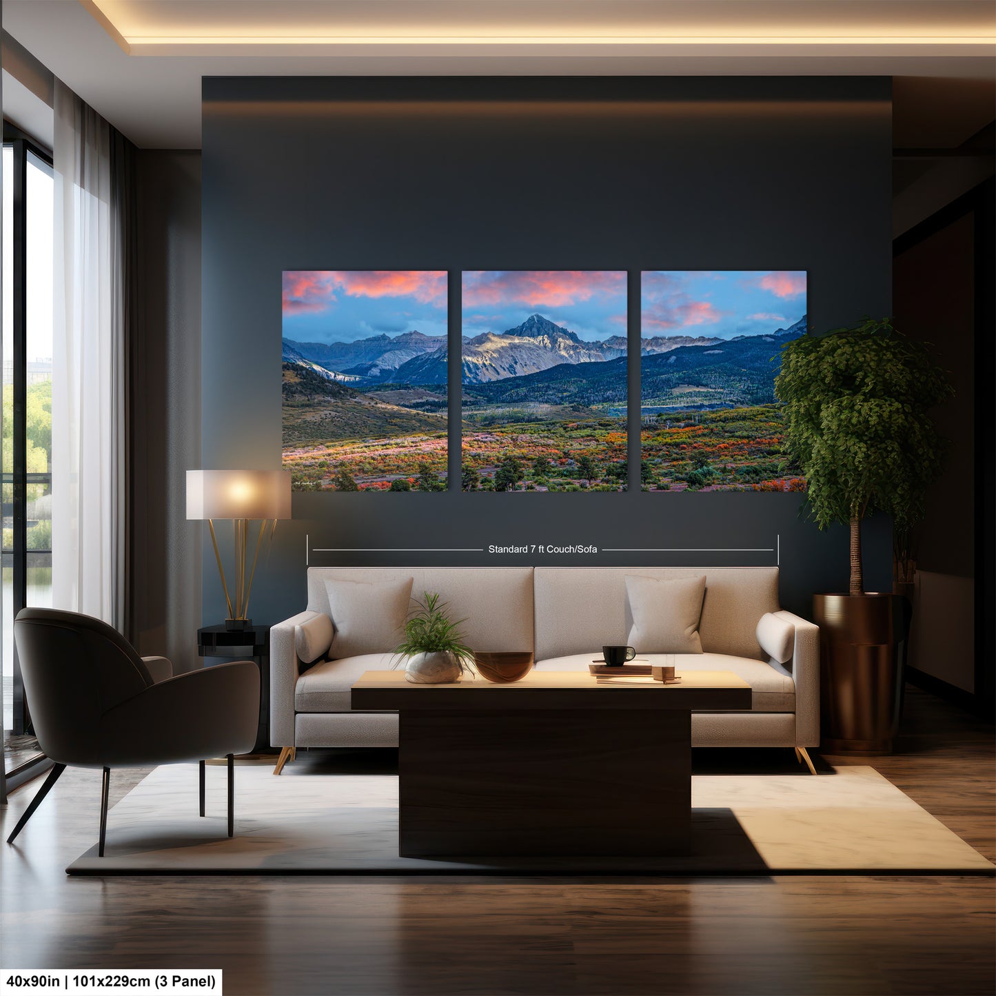 a living room filled with furniture and a painting on the wall