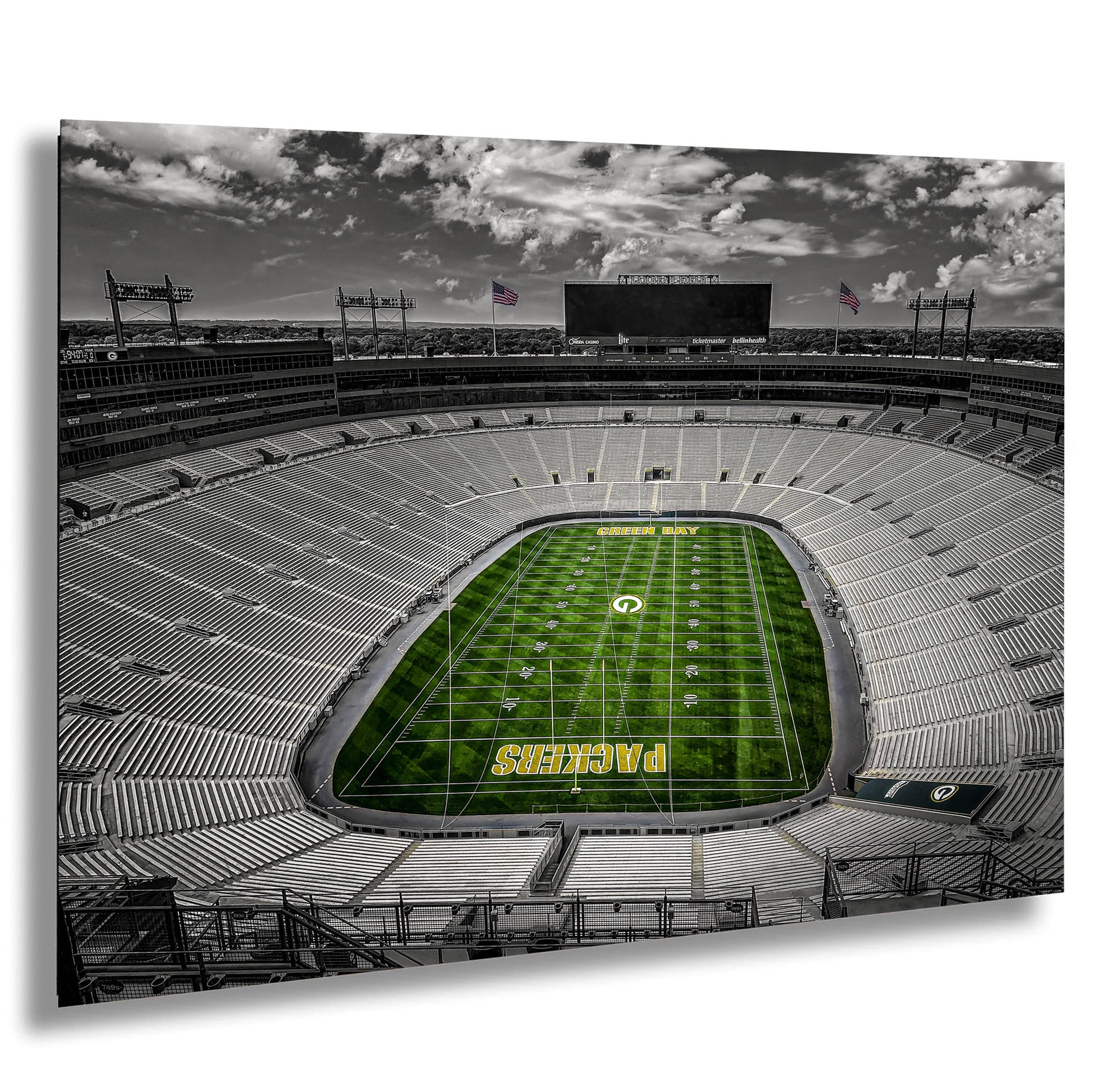 a black and white photo of a football stadium
