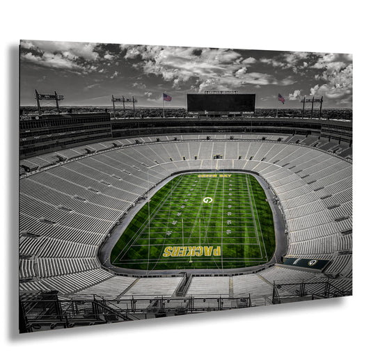 a black and white photo of a football stadium