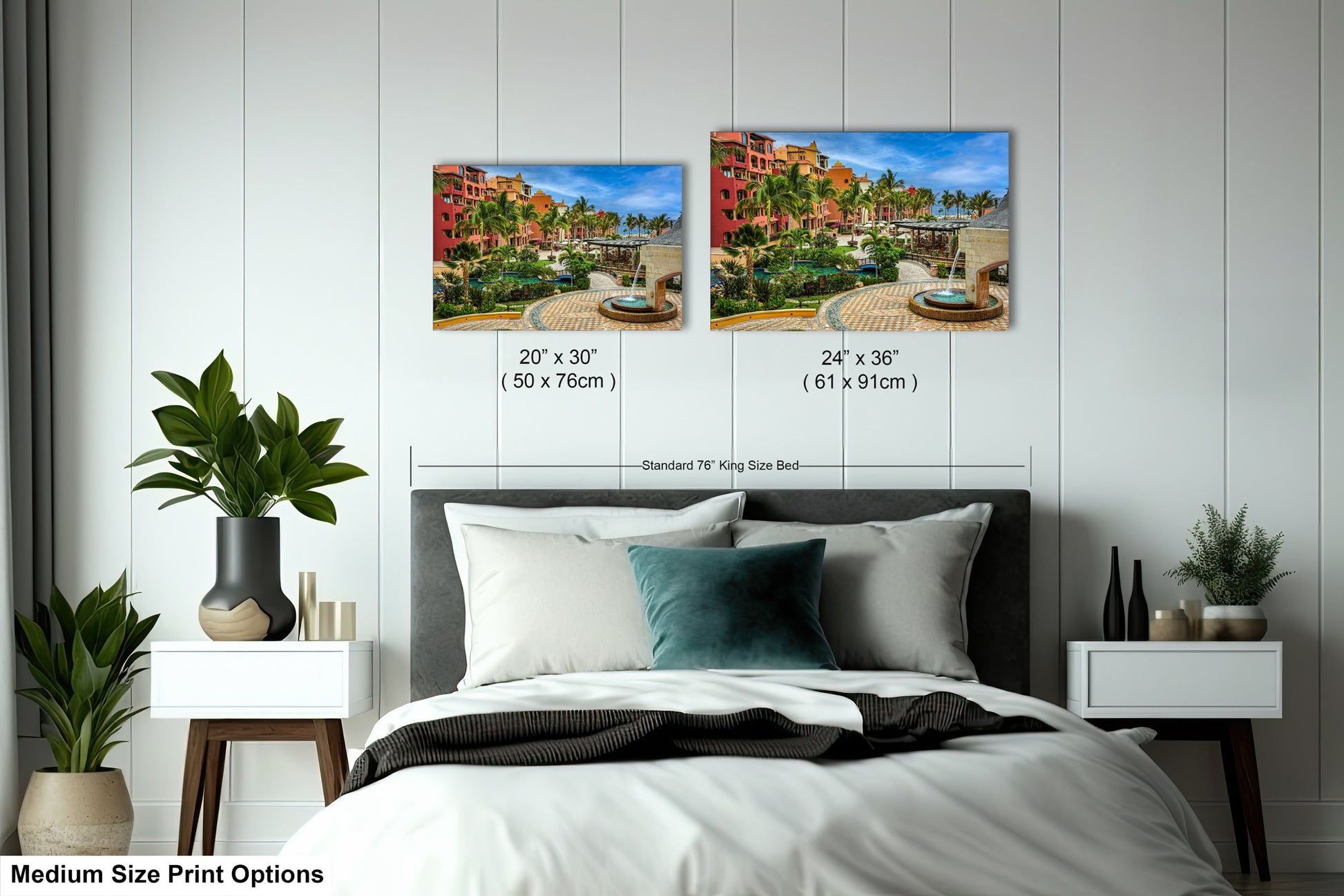 a bed room with a neatly made bed and two pictures on the wall