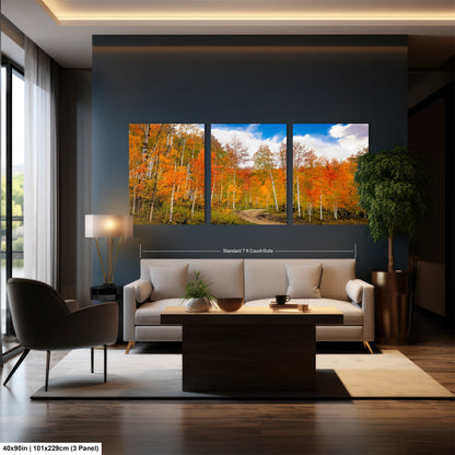 a living room filled with furniture and a painting on the wall