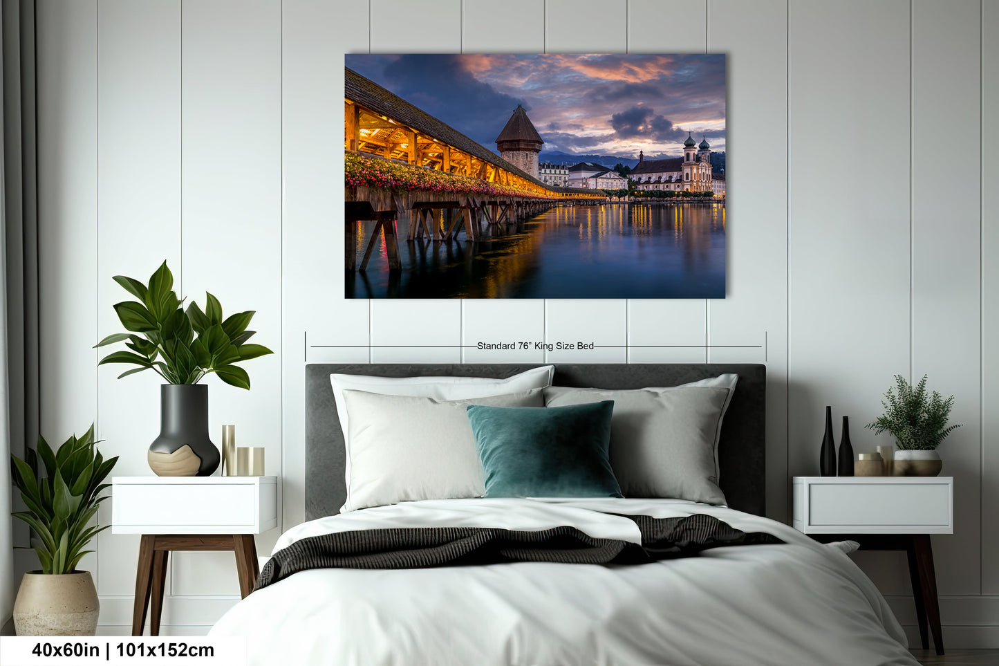 a bedroom with a large bed and a painting on the wall