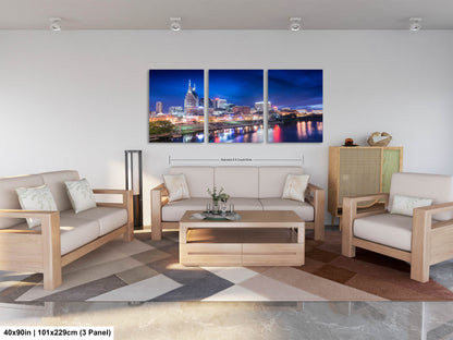a living room filled with furniture and a painting on the wall