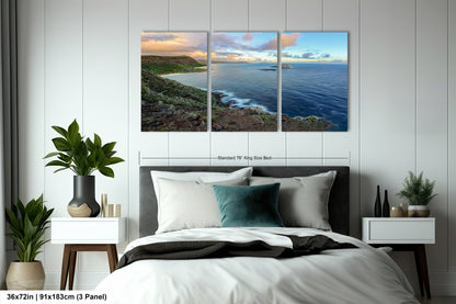 a bedroom scene with a bed and two paintings on the wall