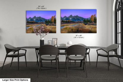 a dining room with a table and chairs