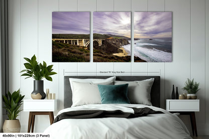 a bedroom scene with a bed and two paintings