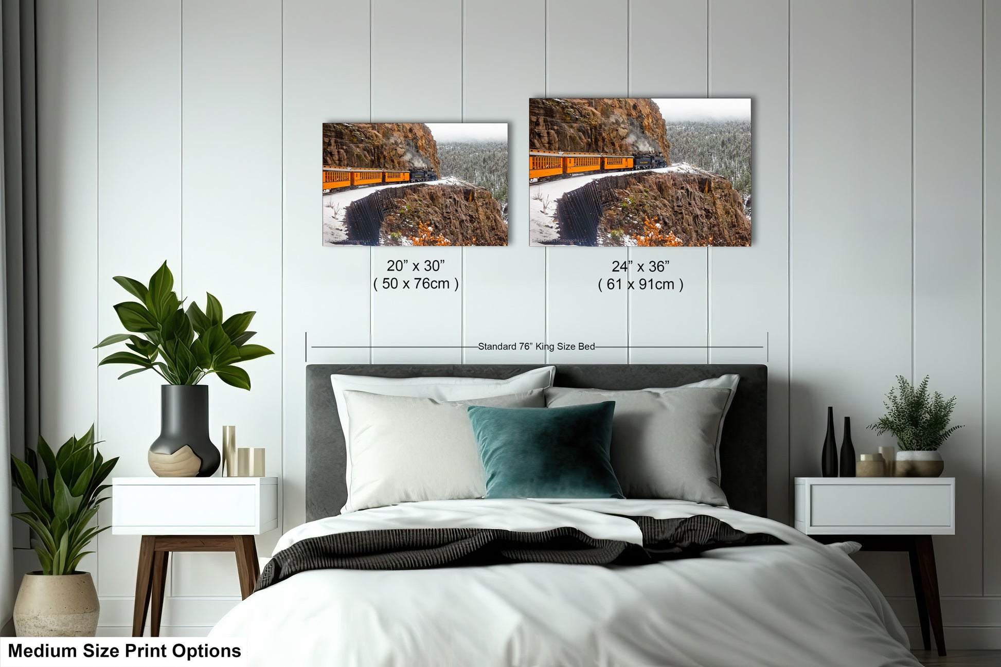 a bed room with a neatly made bed and two pictures on the wall