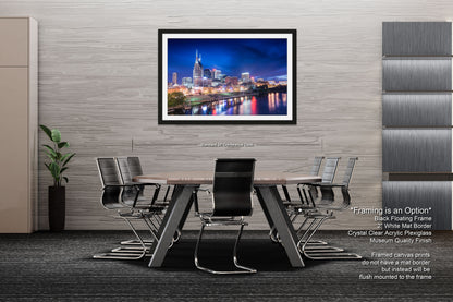 a dining room table with a picture of a city in the background