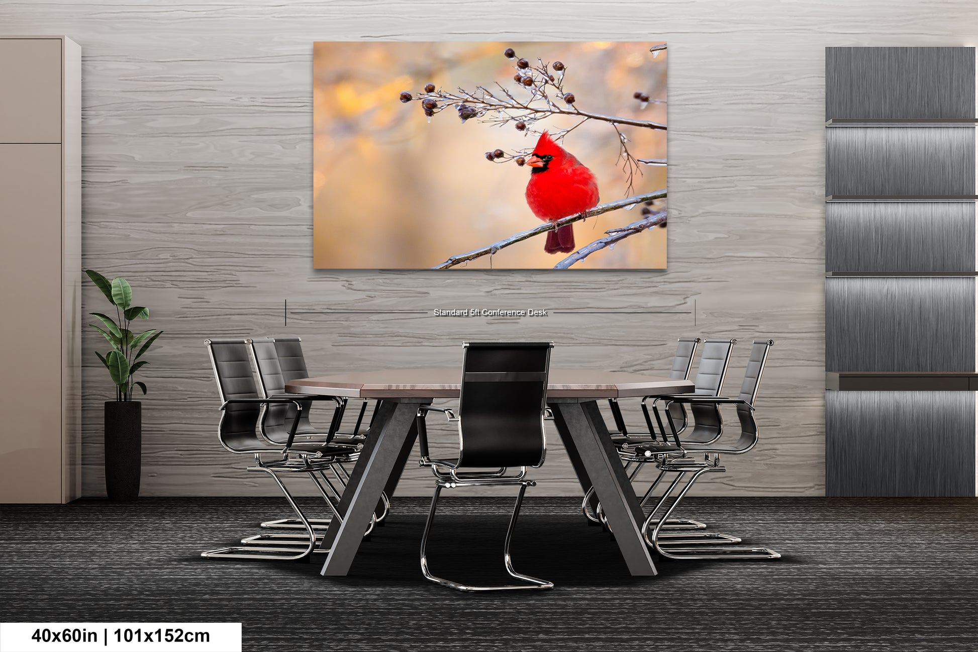 a red bird sitting on a branch of a tree