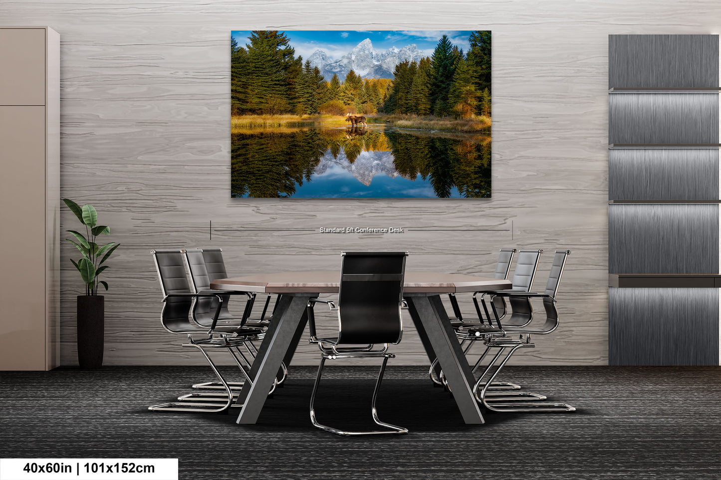 a dining room table with chairs and a painting on the wall