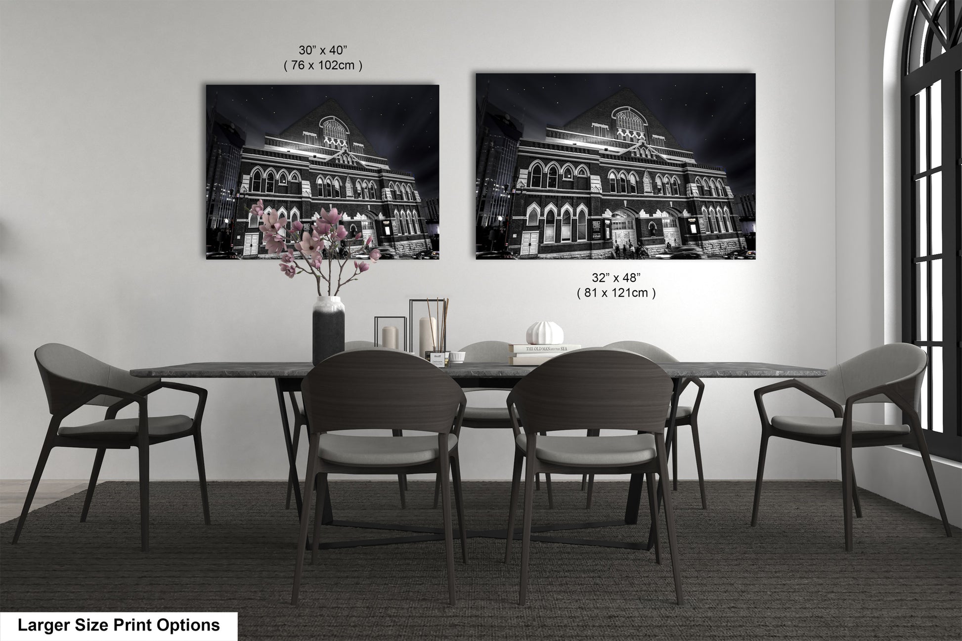 a black and white photo of a dining room