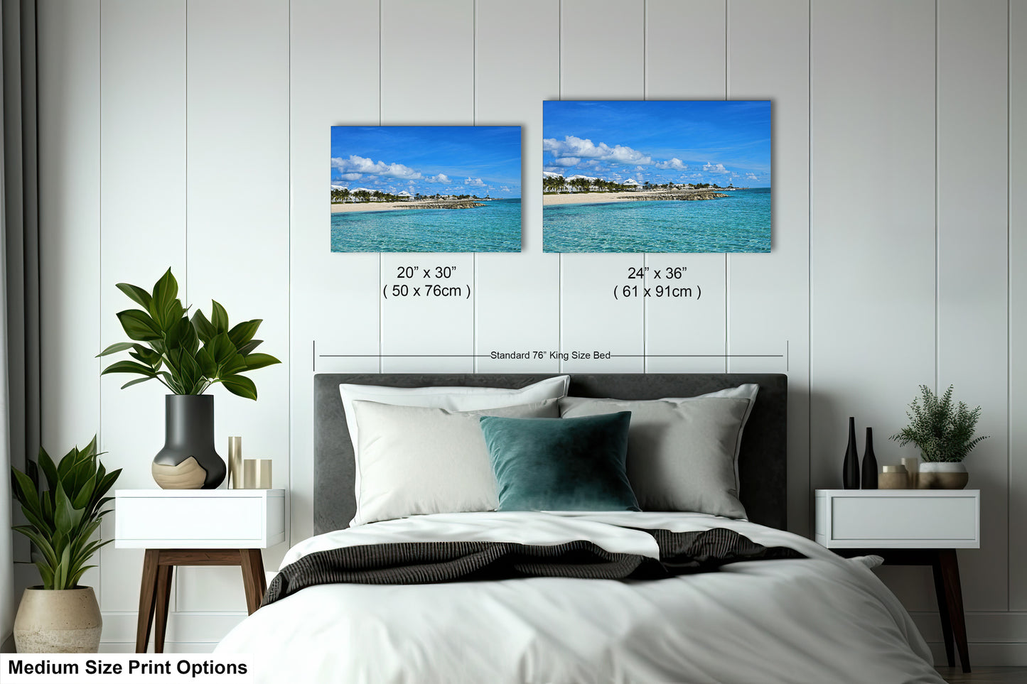 a bedroom with a bed and two pictures on the wall