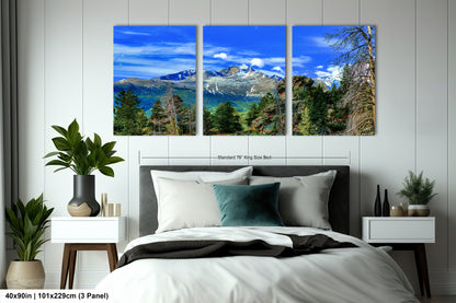a bedroom scene with a bed and two paintings on the wall