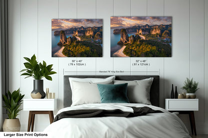 a bedroom with a bed and two pictures on the wall