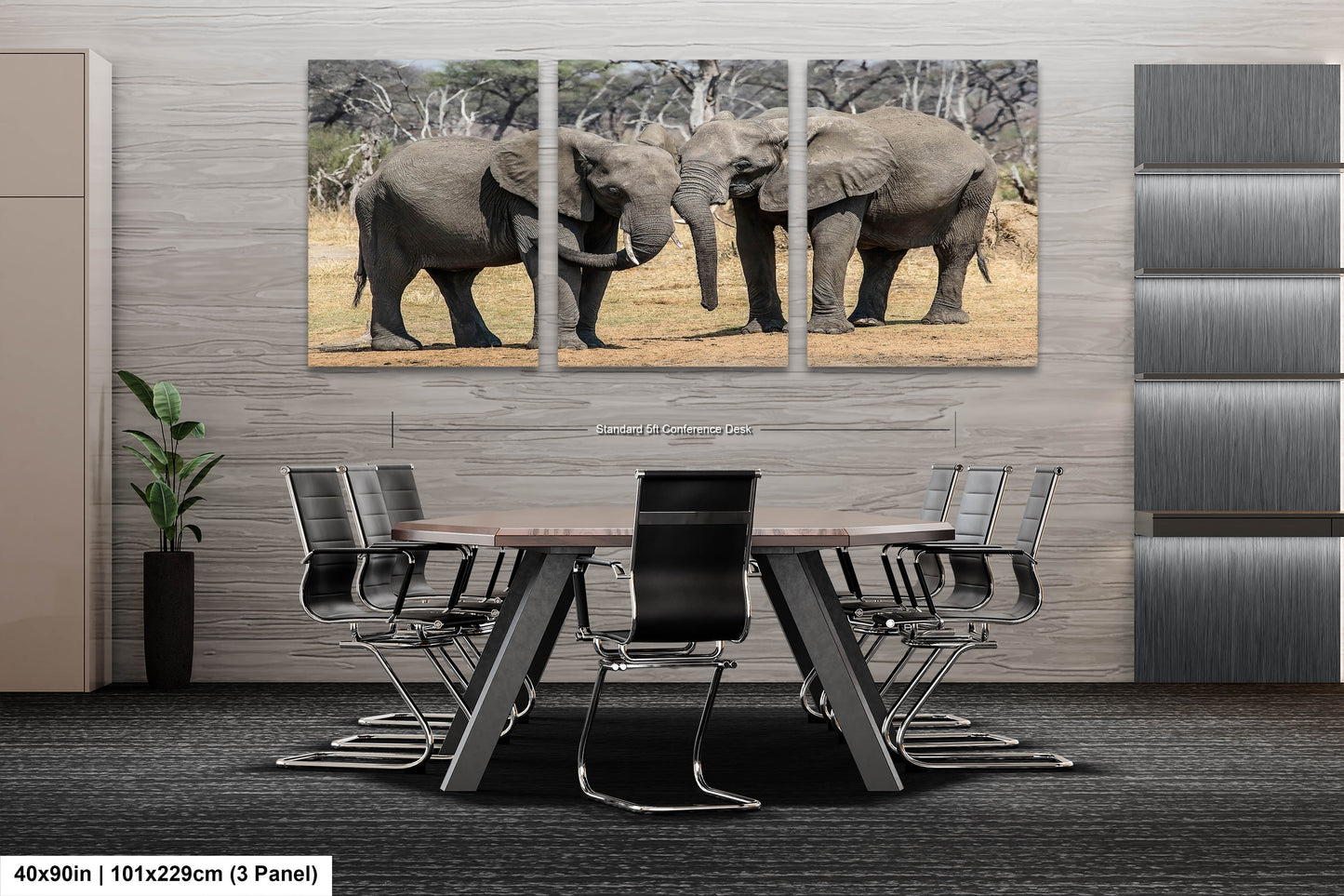 a couple of elephants standing next to each other