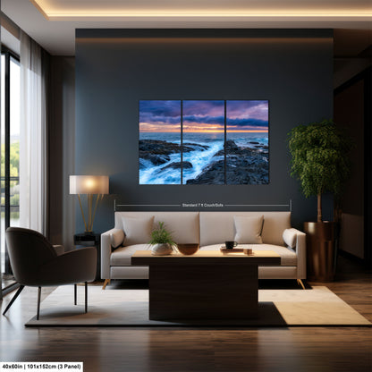 a living room filled with furniture and a painting on the wall