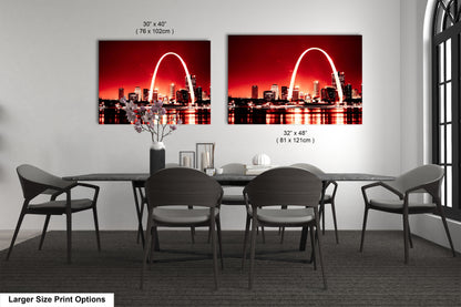 a dining room table with chairs and a picture of the st louis skyline