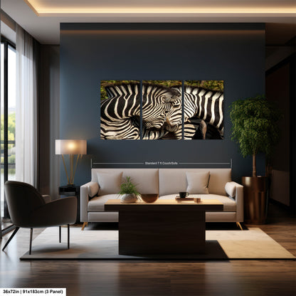 a living room with a couch and two zebras on the wall