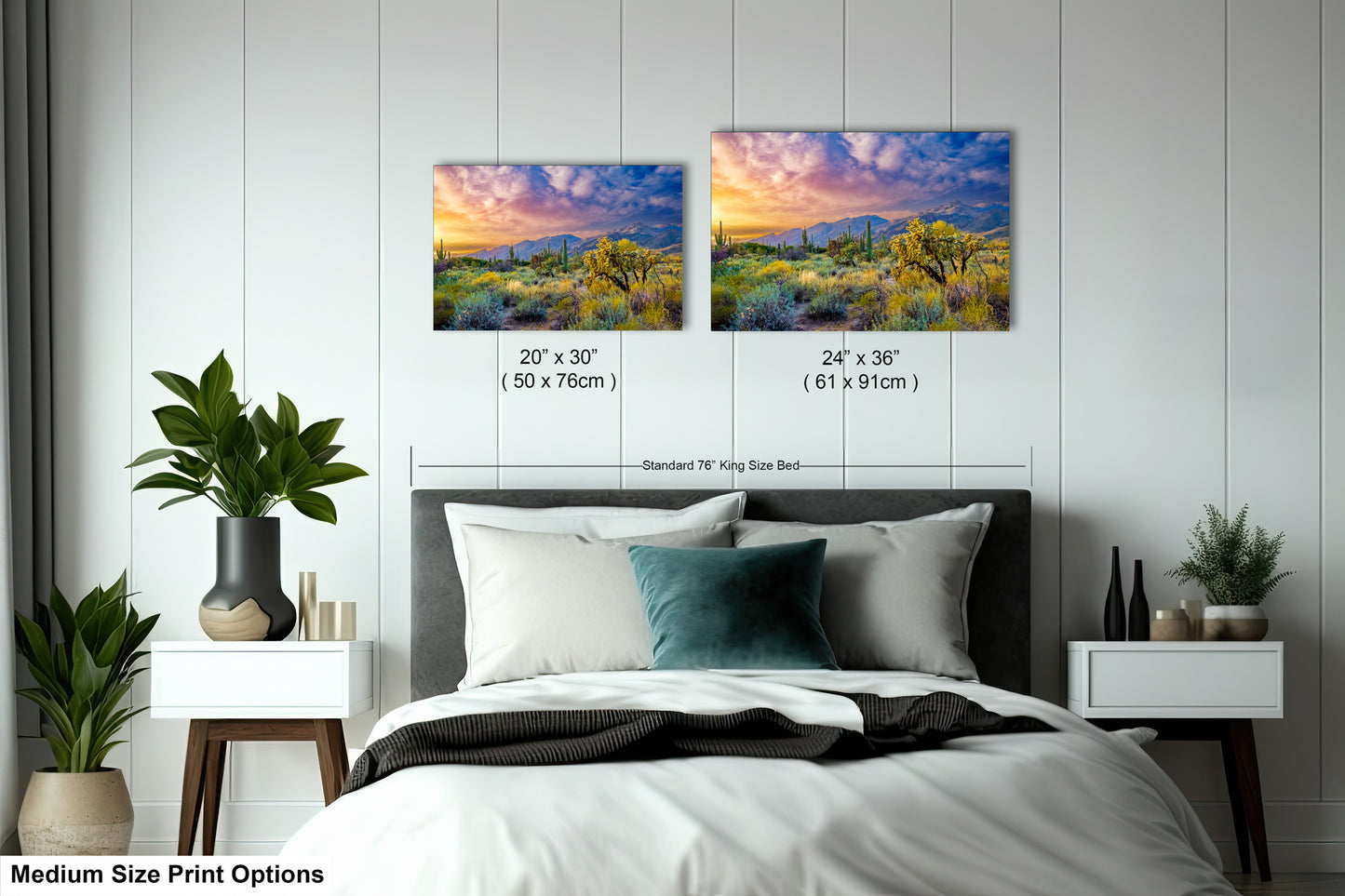 a bed room with a neatly made bed and two pictures on the wall