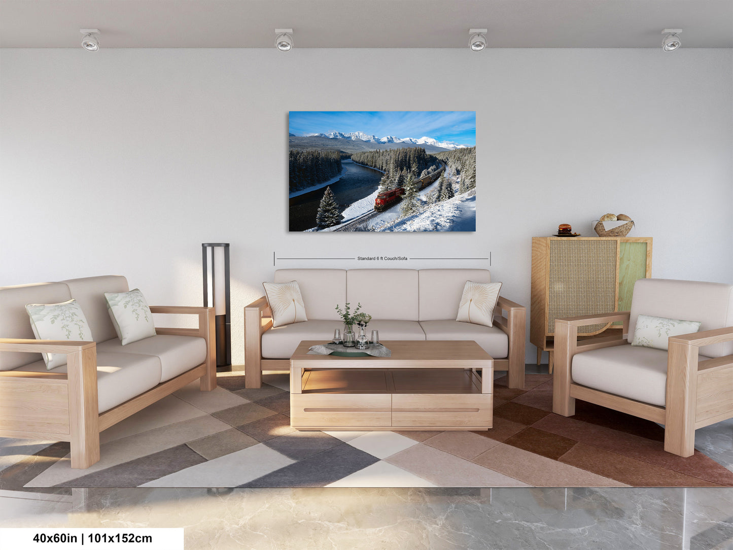 a cozy living room with a large landscape painting hanging on the wall, featuring a snowy mountain landscape with a train passing through.