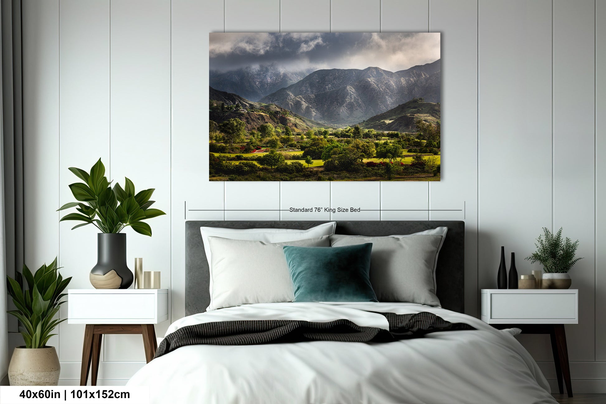 a bedroom with a bed and a painting on the wall