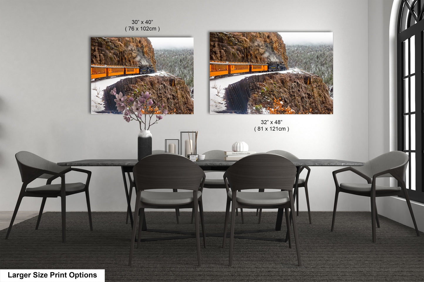 a dining room with a table and chairs