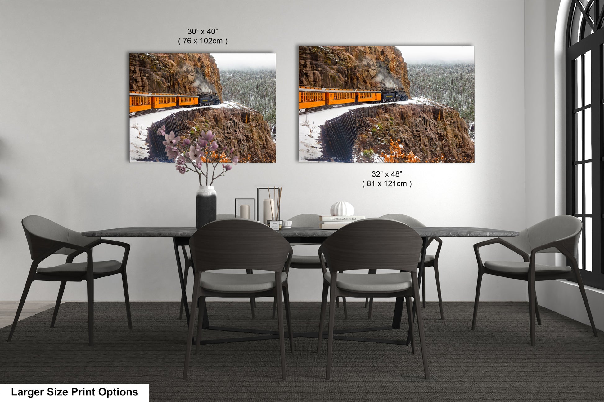 a dining room with a table and chairs