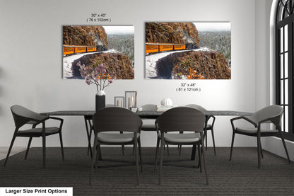 a dining room with a table and chairs