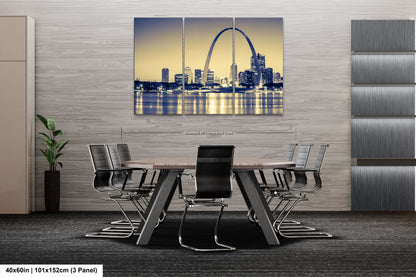 a dining room table with a view of the st louis skyline