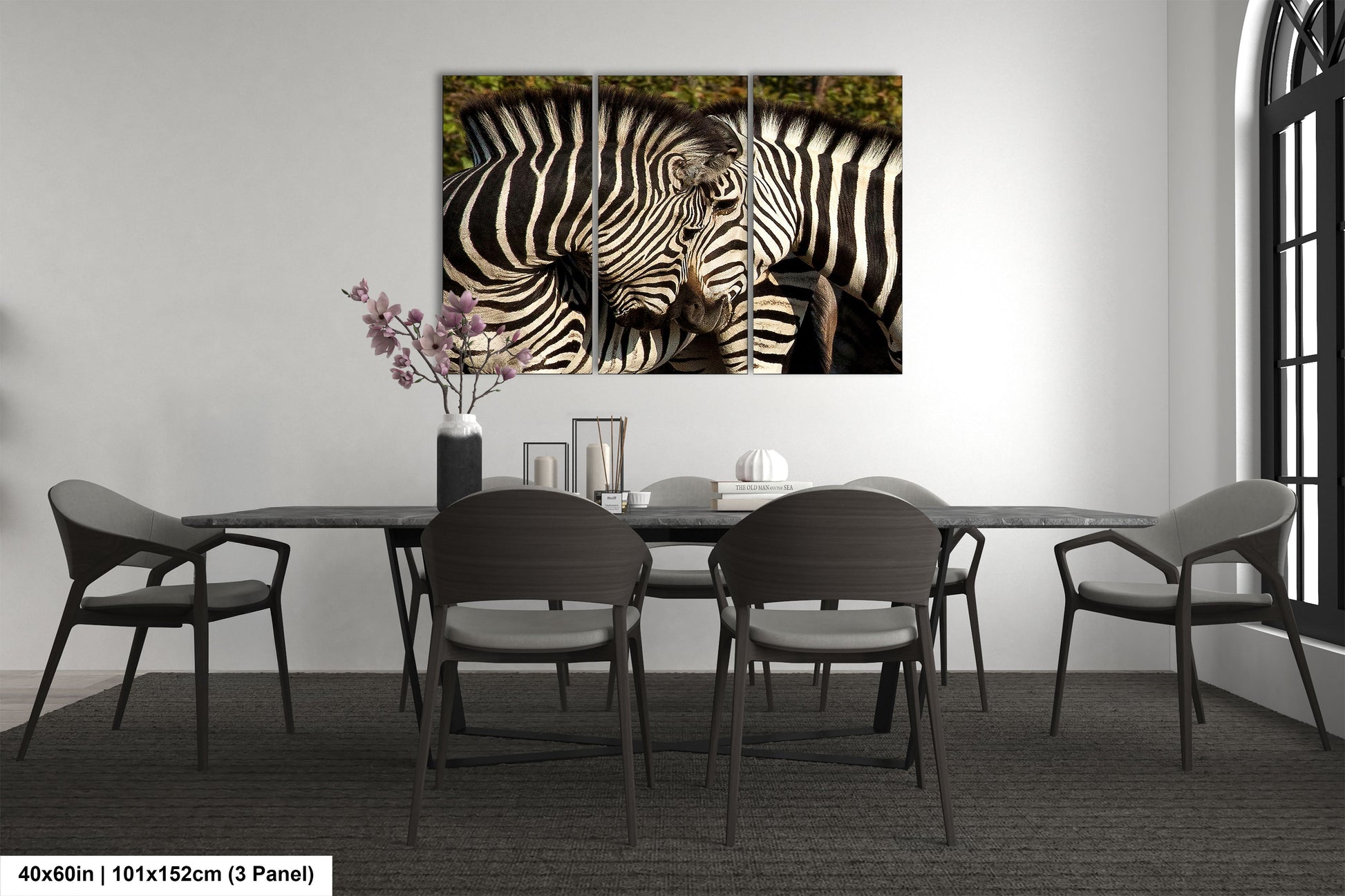 a couple of zebra standing next to each other