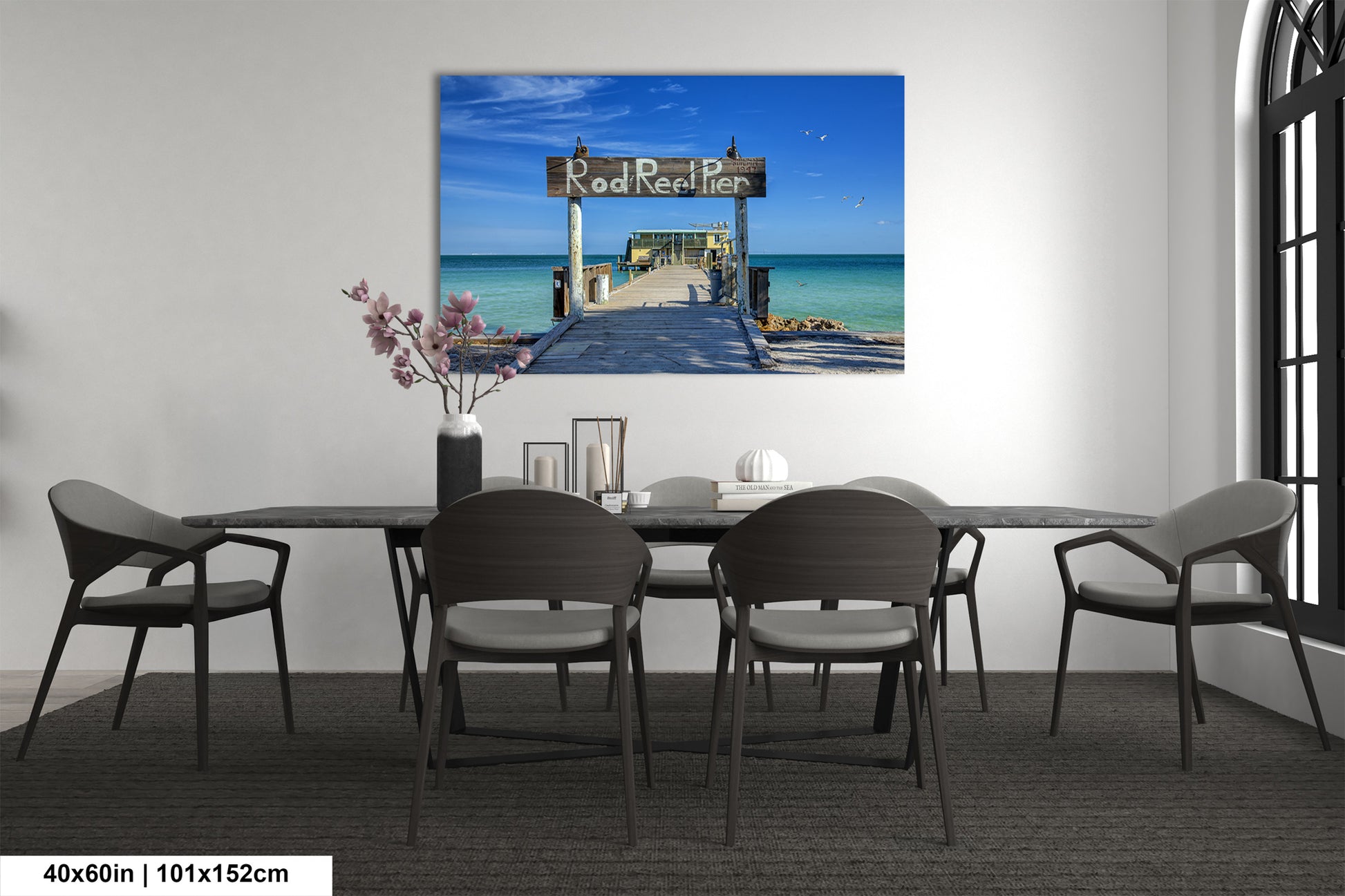 a dining room with a table and chairs