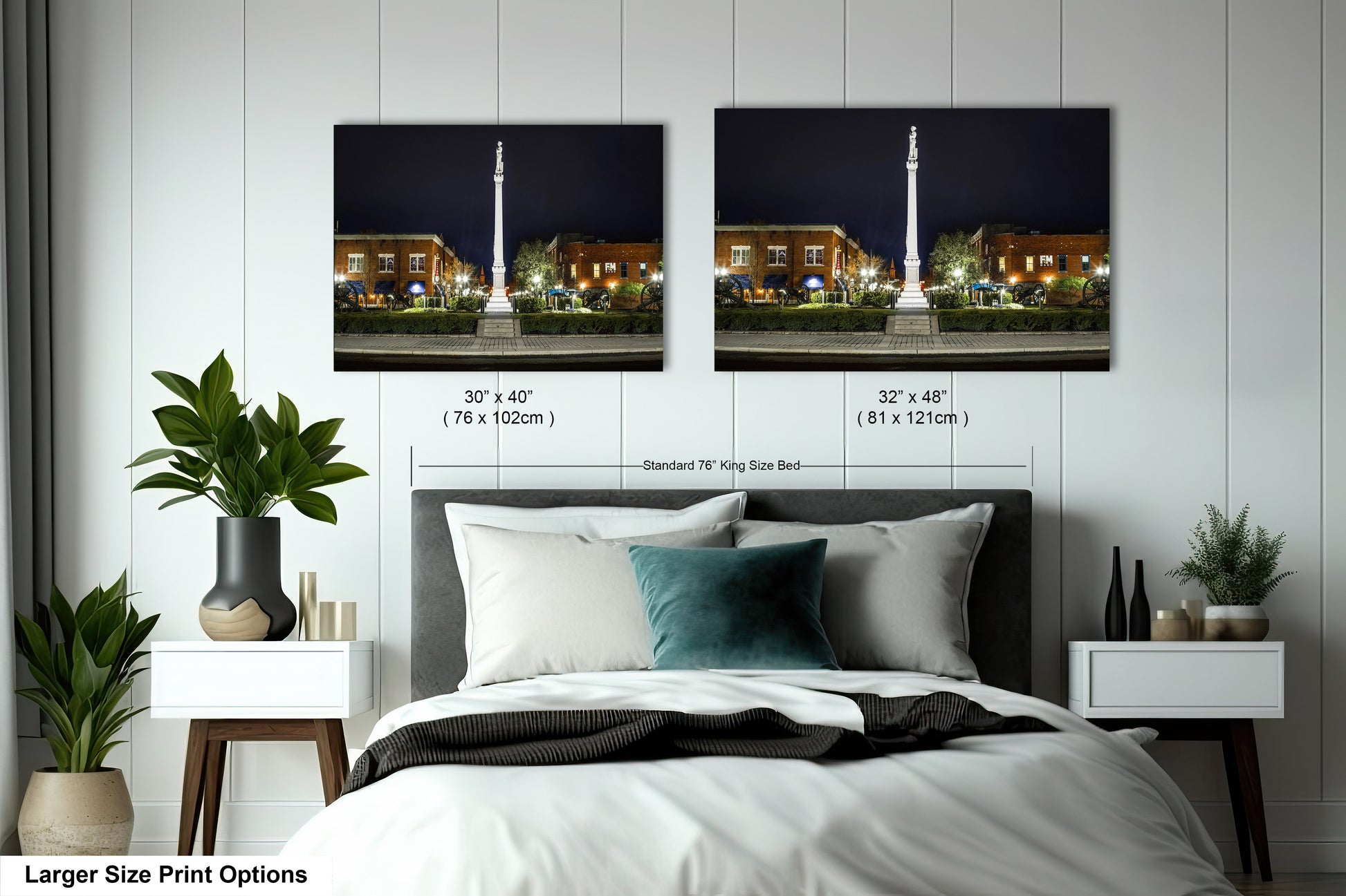 a bedroom with a bed and two pictures on the wall