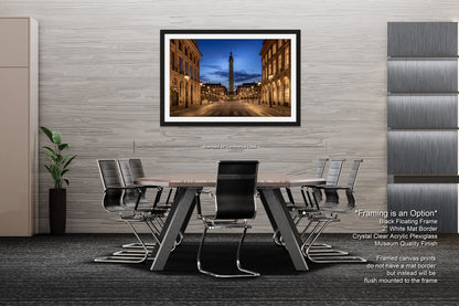 a picture of a city street with a clock tower in the background
