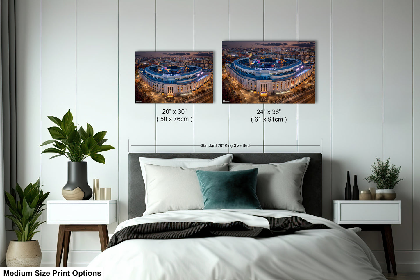 a bedroom with a bed and two pictures on the wall