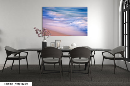 a dining room table with chairs and a painting on the wall
