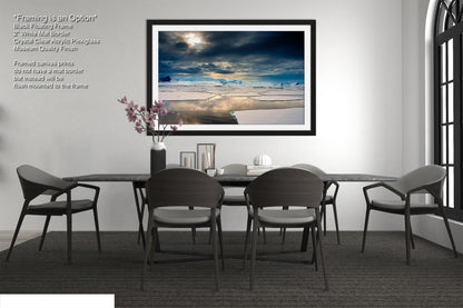 a picture of a dining room with a table and chairs