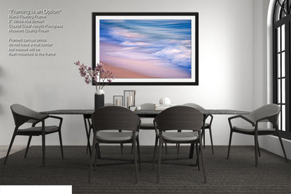 a picture of a dining room with a table and chairs