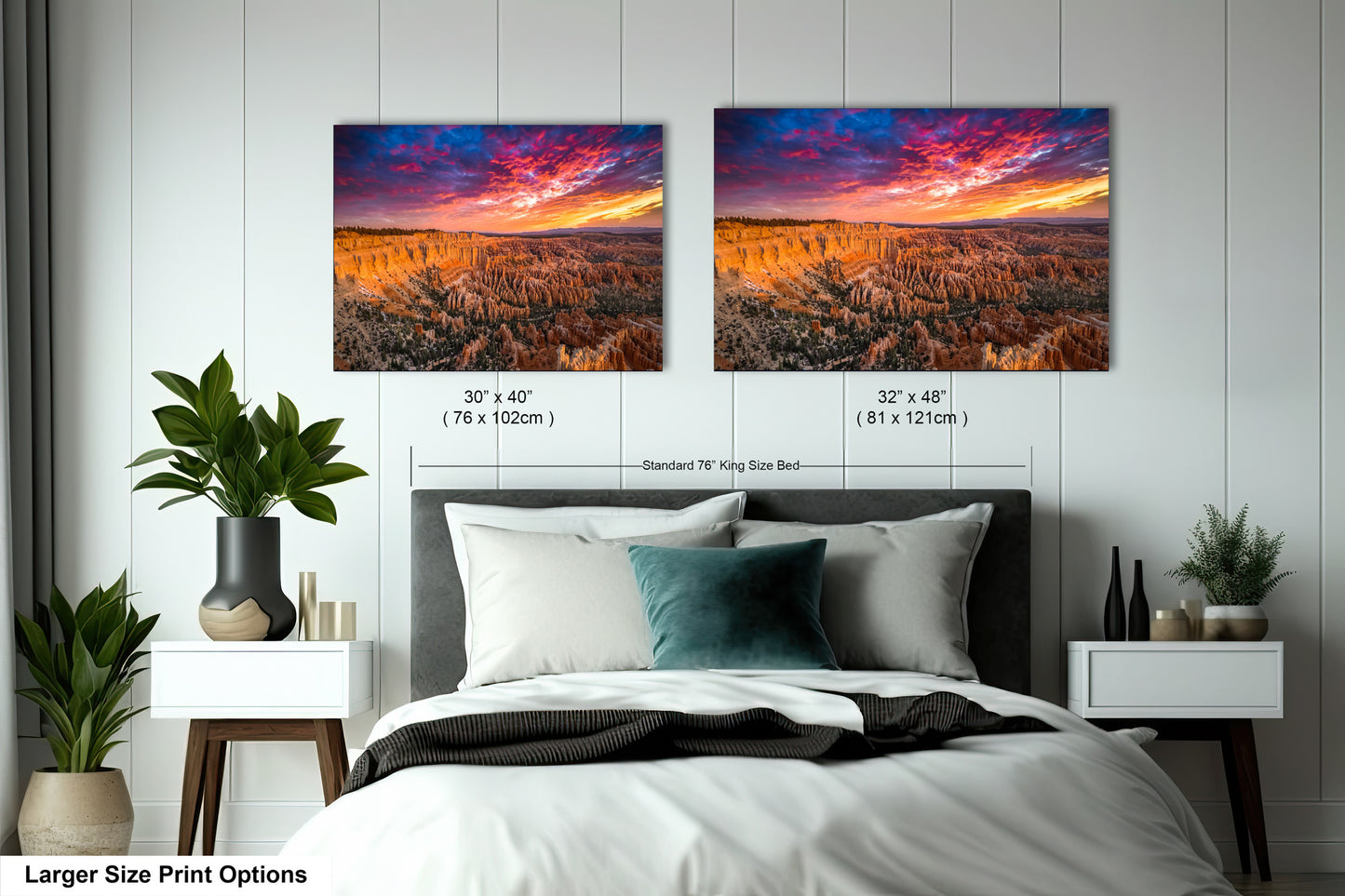 a bedroom with a bed and two pictures on the wall