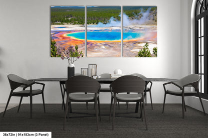 a dining room table with four chairs and a painting on the wall