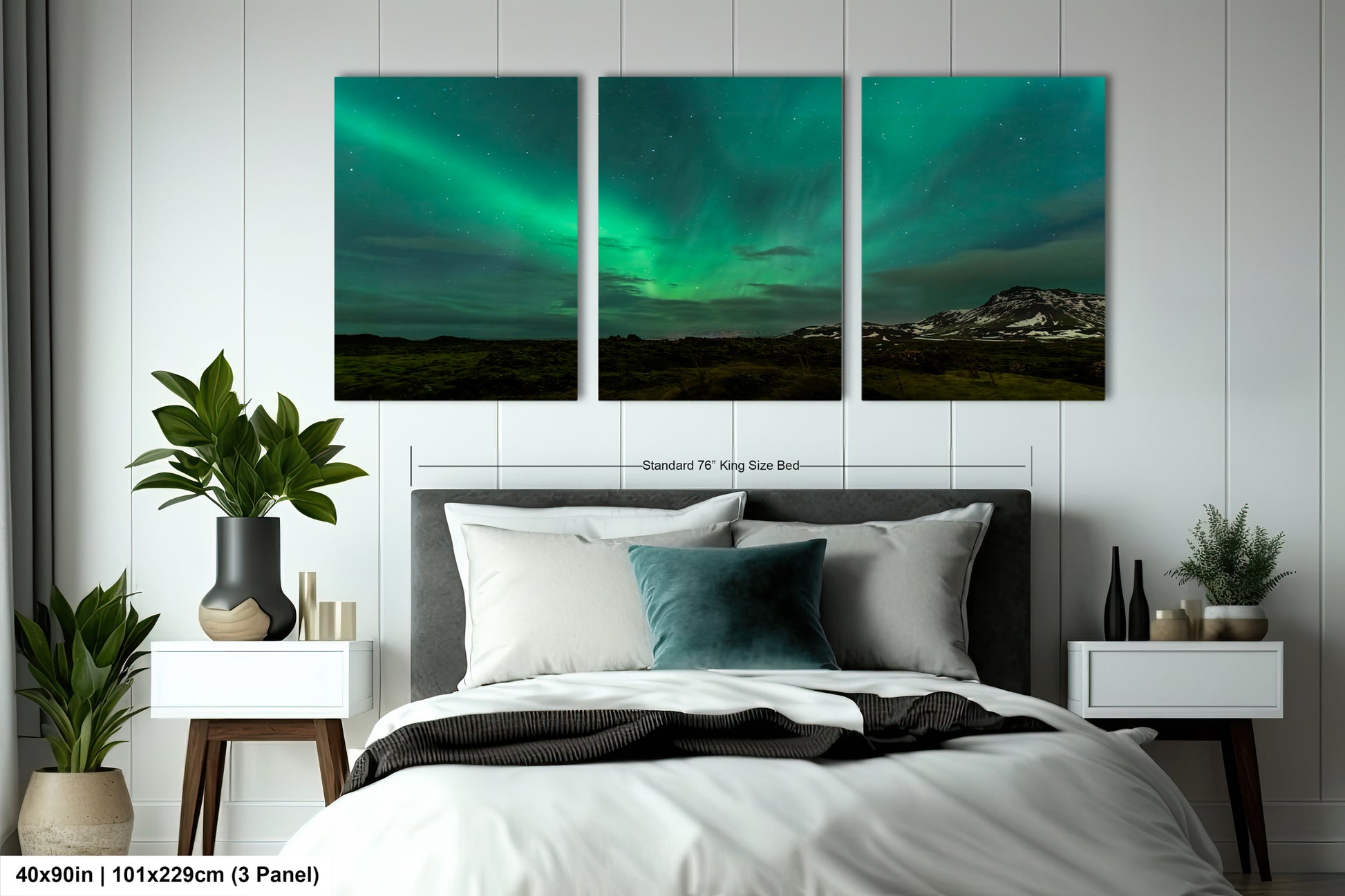 a bed room with a neatly made bed and three paintings on the wall