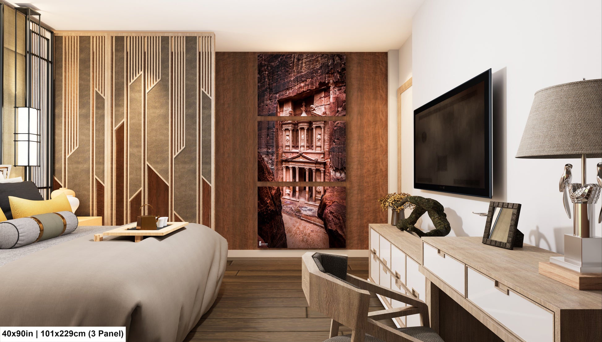a bedroom with a large bed and a tv mounted on the wall