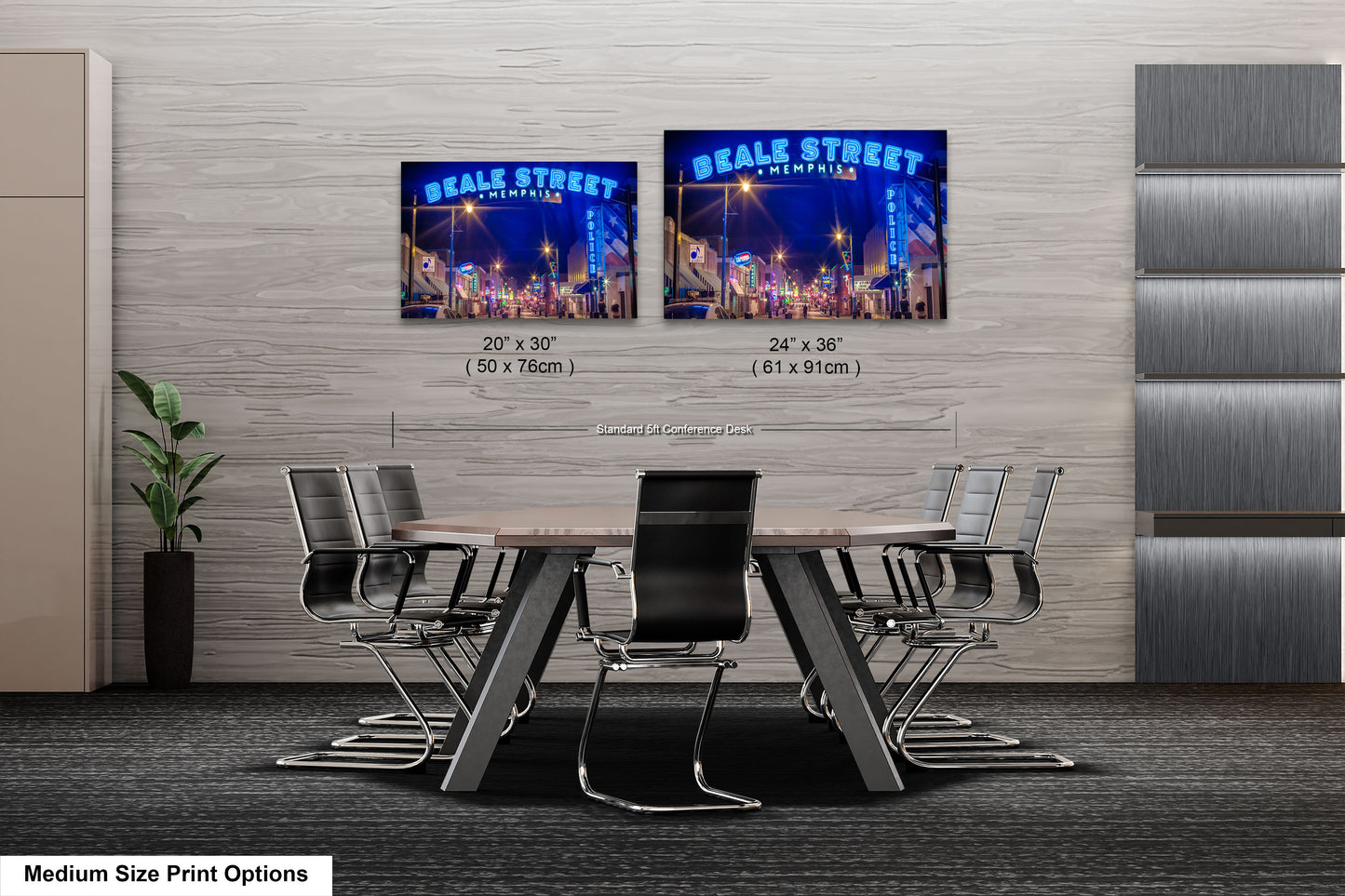 a table and chairs in a room with two pictures on the wall
