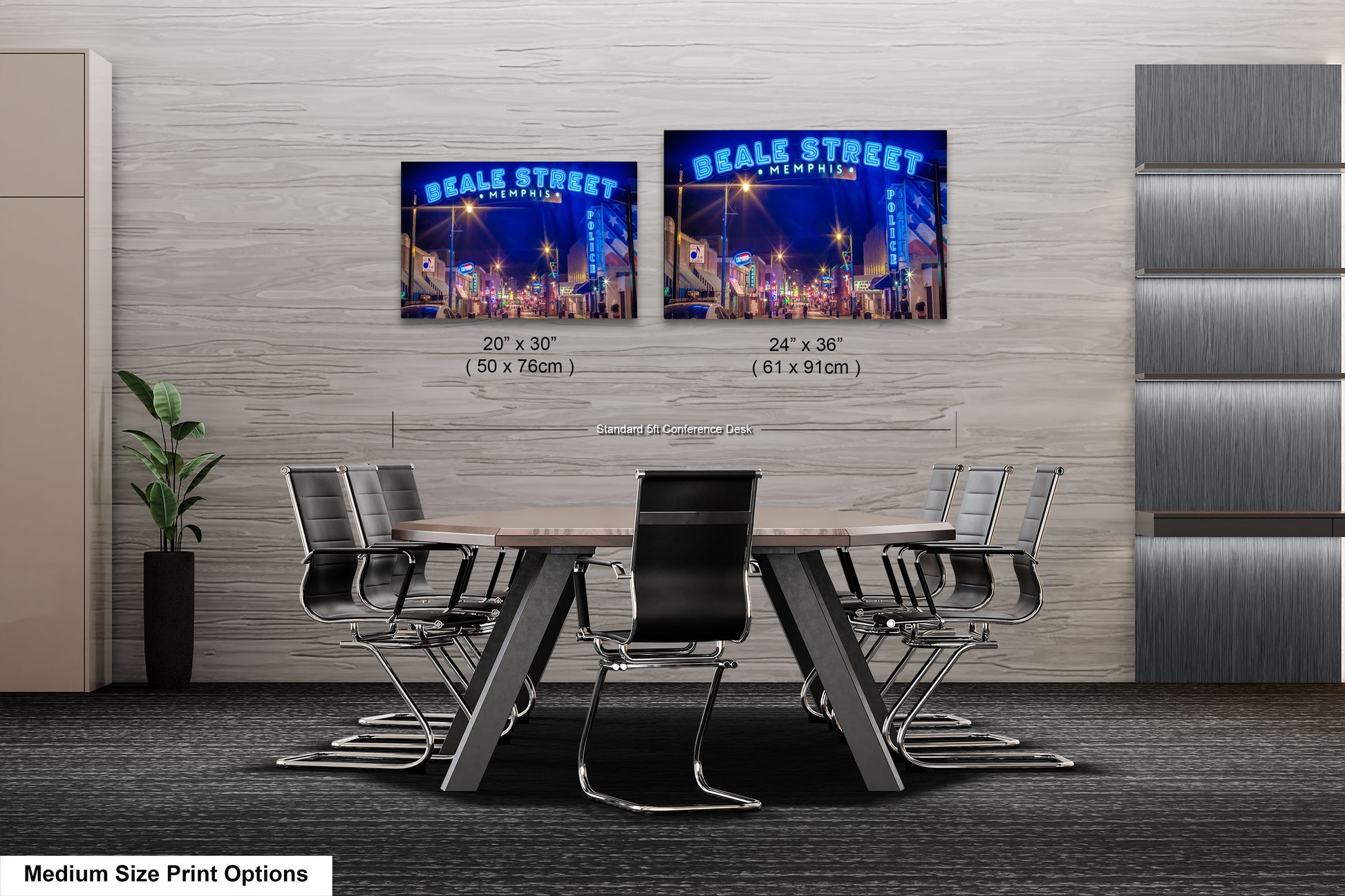 a table and chairs in a room with two pictures on the wall