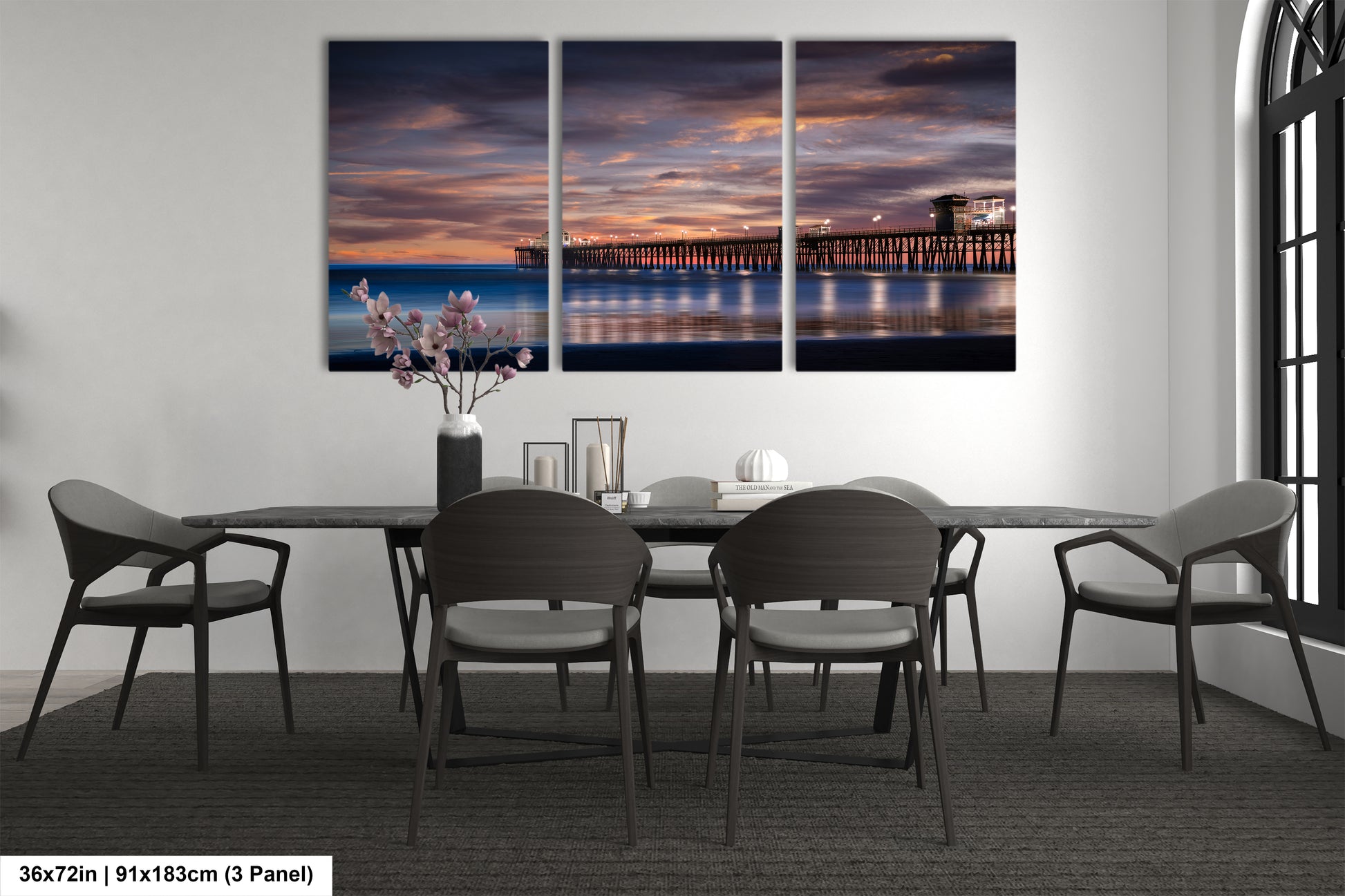a dining room with a table and chairs