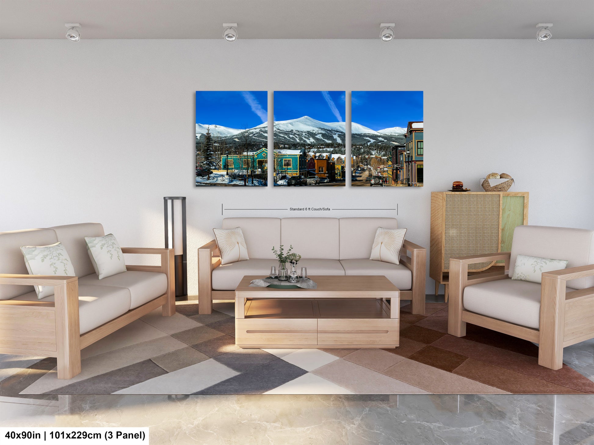 a living room filled with furniture and a painting on the wall