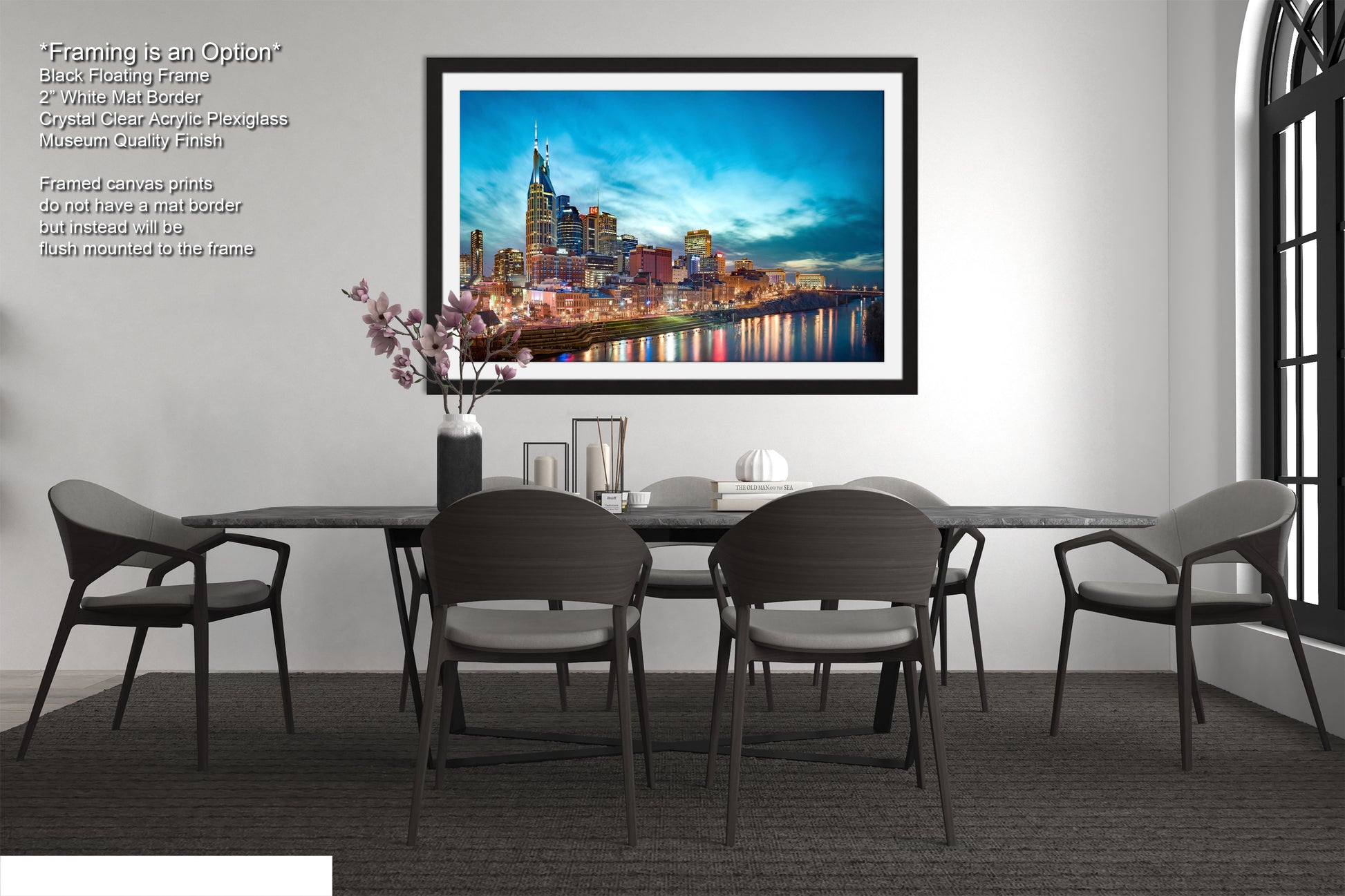 a painting of a city skyline hangs above a dining room table
